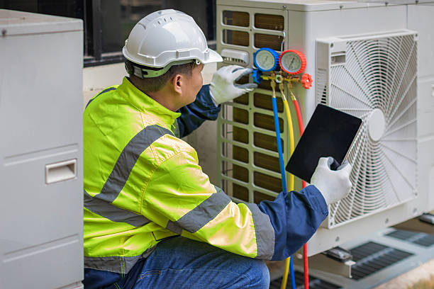 Professional Air Duct Cleaning technician working in Colfax, NC